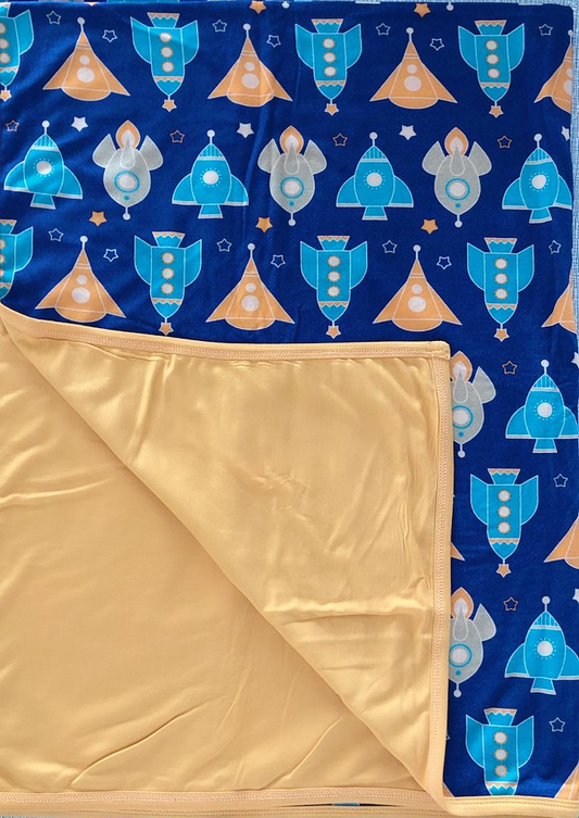 Two layers of blanket blue rocket